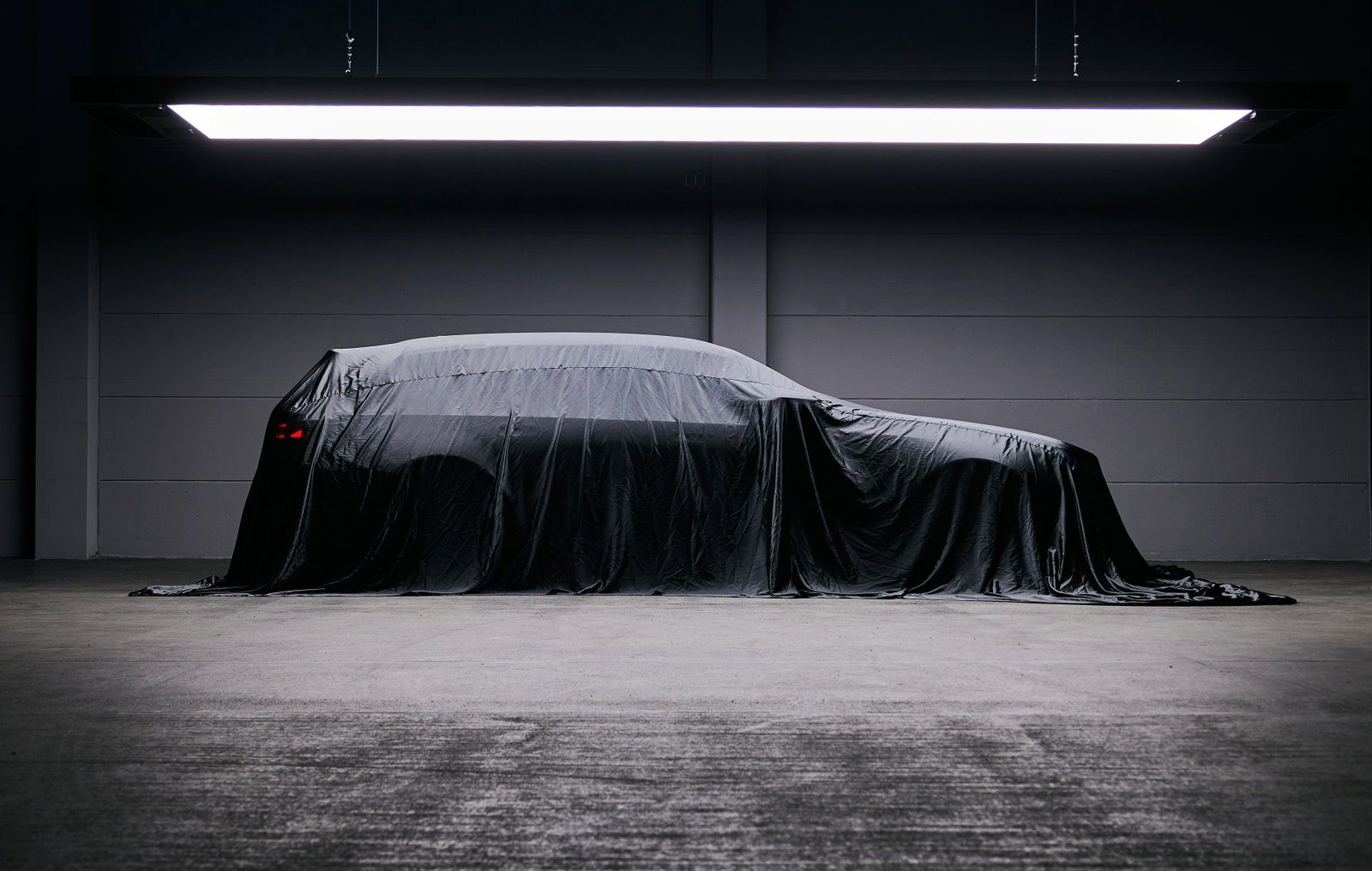 BMW M5 Touring under a cover